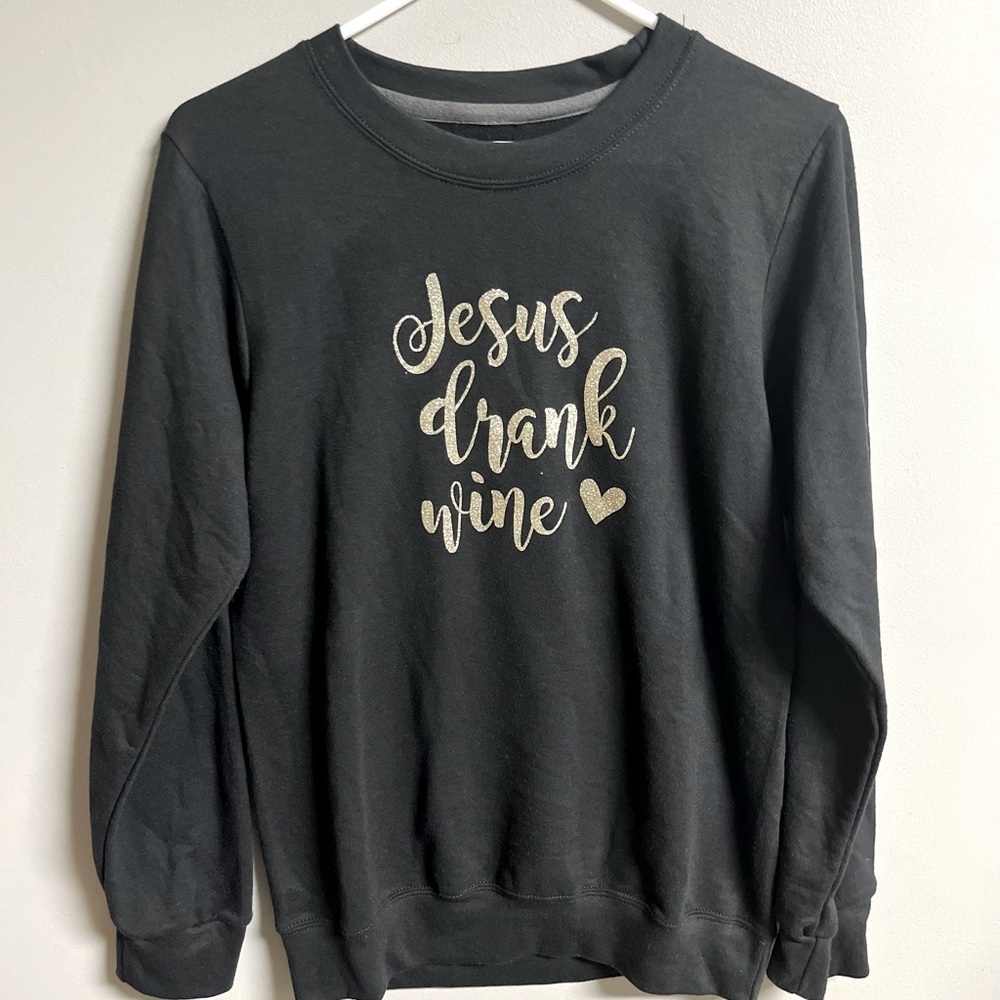 Size small. Purchased and added vinyl. Never worn